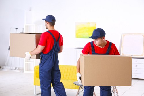 Removal Company Belsizepark vehicle loading reusable items for recycling and donation