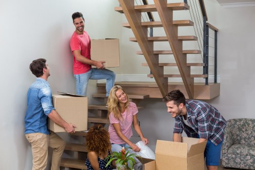 Removal team beginning a move in Belsize Park with careful preparation