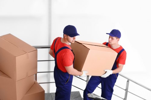 Team separating cardboard, wood, and metals during a Belsize Park clearance