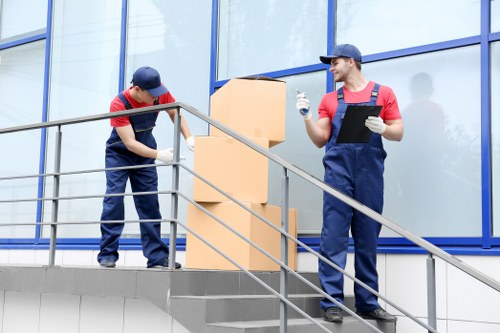 Professional movers handling an office relocation in Belsizepark