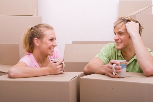 Local removals service handling furniture and boxes in a Belsize Park flat
