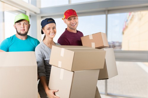 Packed moving boxes and furniture ready for a Belsize Park flat removal