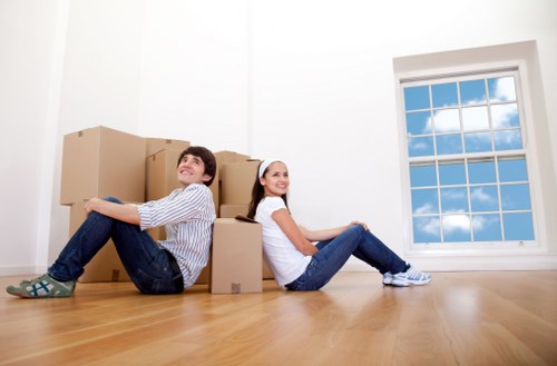 Careful unloading of household items at a Belsize Park flat