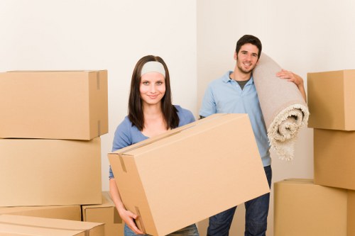 Packed office furniture prepared for relocation services in Belsizepark