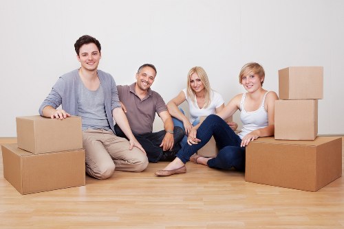 Furniture and boxes being loaded into a van for a local move