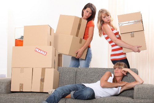 Student moving service helping with boxes, luggage, and furniture in Belsize Park