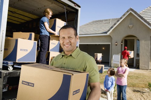 Fragile items safely wrapped and labeled inside moving boxes