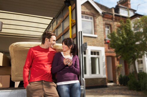 Movers securing items carefully during transport